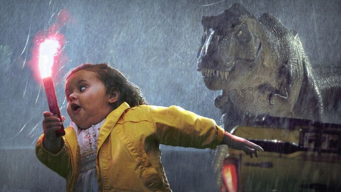 Girl with flare running from T-Rex in Jurassic Park