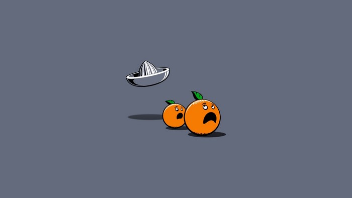 Oranges and juicer with scared expressions