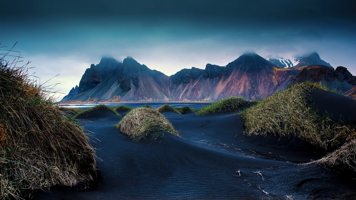 Black sand dunes and mountains in Iceland