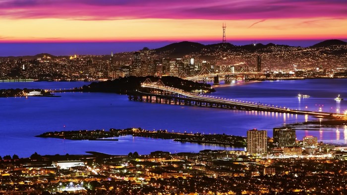 San Francisco Bay Bridge and skyline at sunset