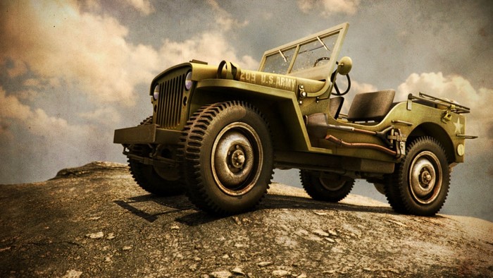 Olive green Willys army jeep on rocky terrain