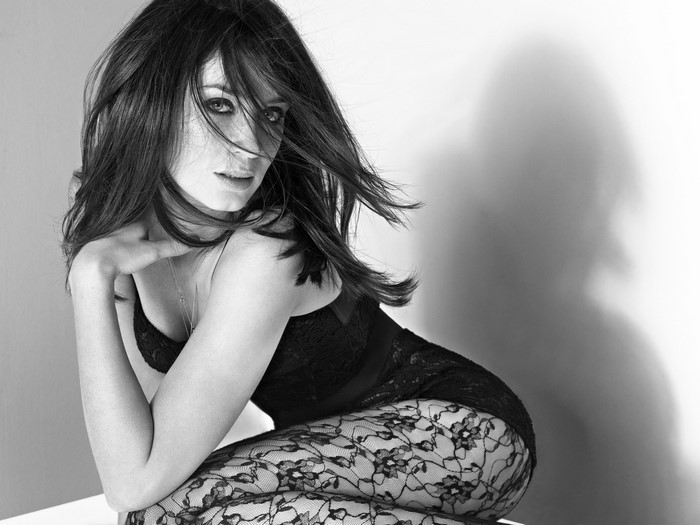 Emily Blunt in Elegant Lingerie and Stockings