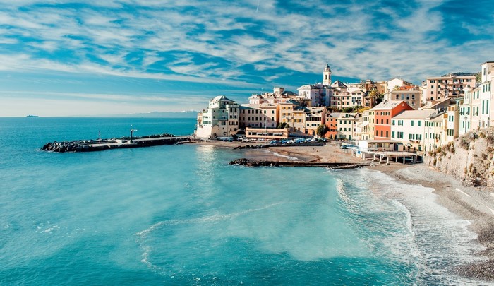 Colorful buildings on a cliff overlooking the sea in Italy