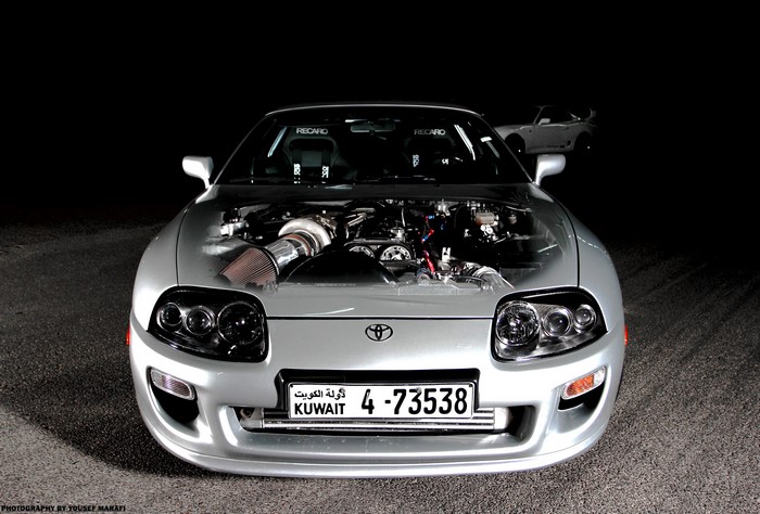 Toyota Supra with exposed engine and turbocharger