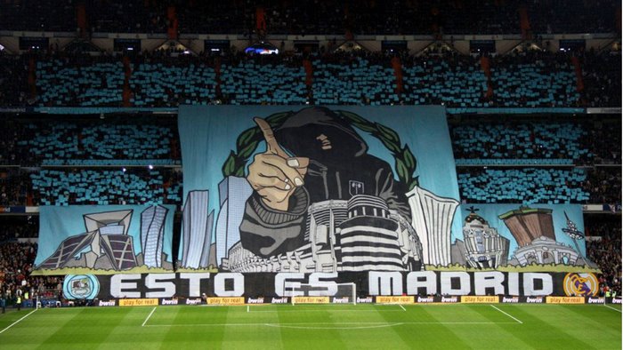 Real Madrid supporters display banner in stadium