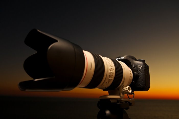 Canon EOS 7D DSLR camera with telephoto lens