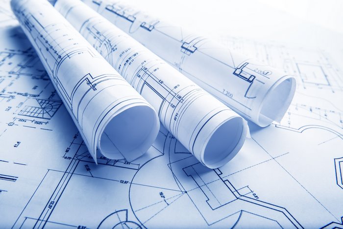 Rolled architectural blueprints