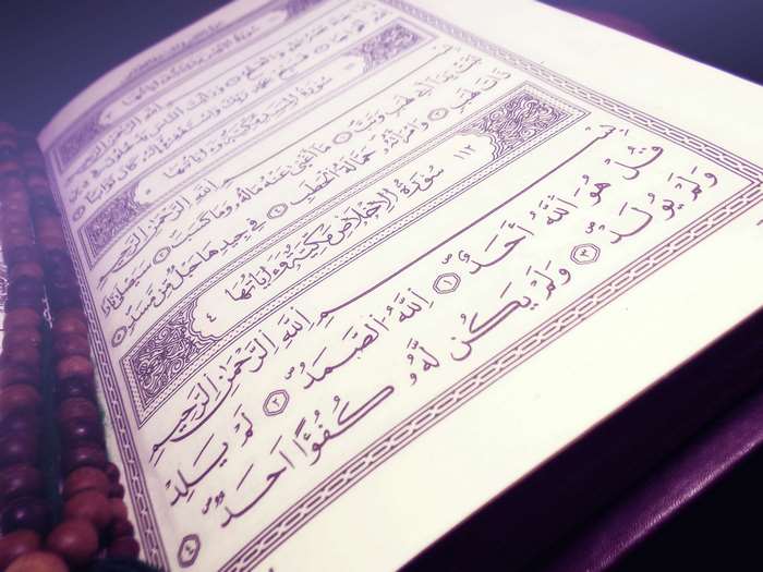 The Holy Quran with prayer beads