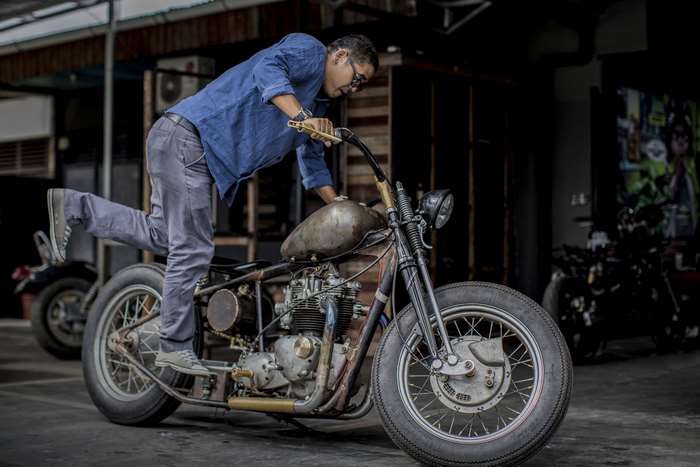 Man with custom bobber motorcycle in Pekanbaru