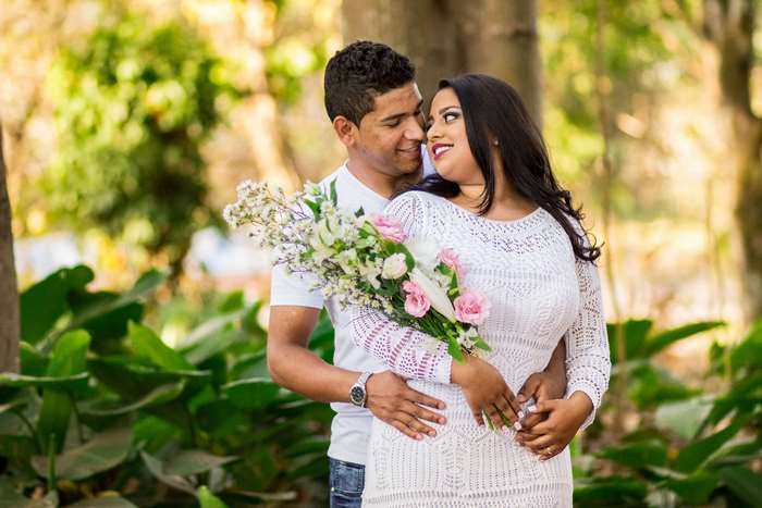 Couple holding flowers outdoors 4k