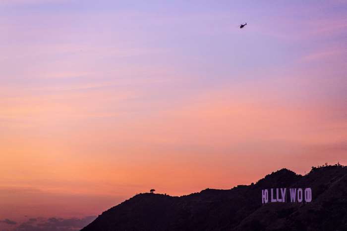 Hollywood Sign and Helicopter at Sunset