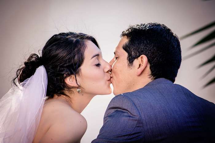 Romantic Bride and Groom Sharing a Kiss