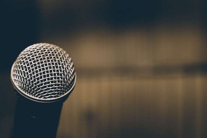 Close up of a microphone with a mesh screen