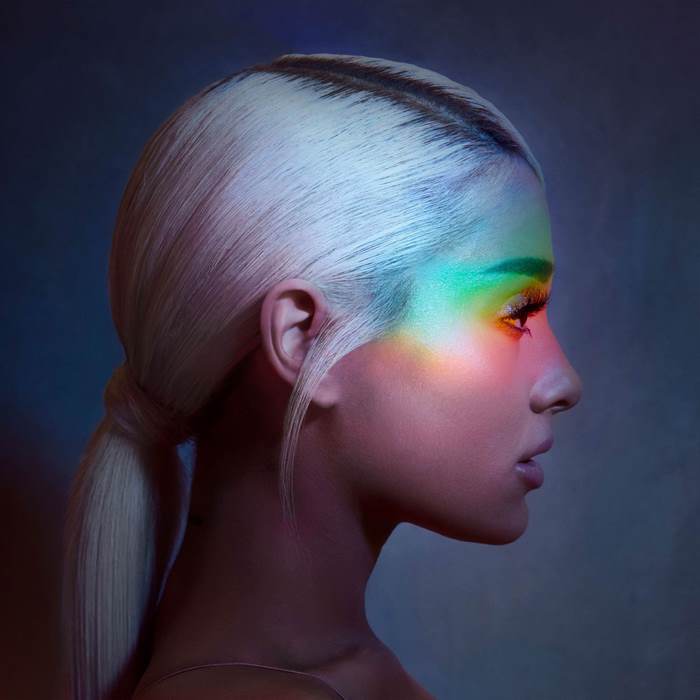 Ariana Grande with rainbow light on face