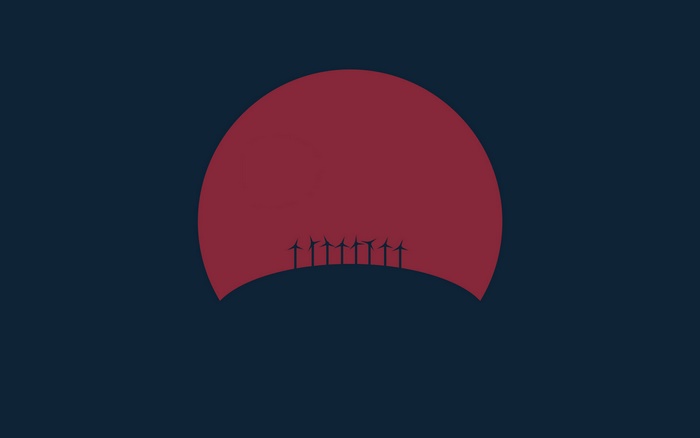 Windmills on a hill at sunset 4K