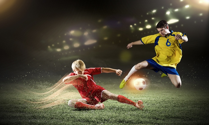 Soccer players in a stadium during a match