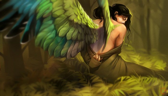 Angel with green wings in a forest