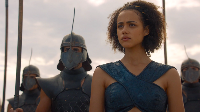 Missandei from Game of Thrones with Unsullied guards