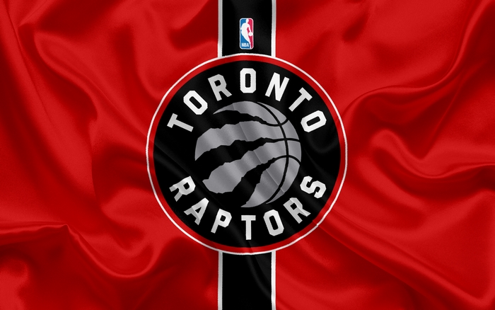 Toronto Raptors NBA logo on red fabric