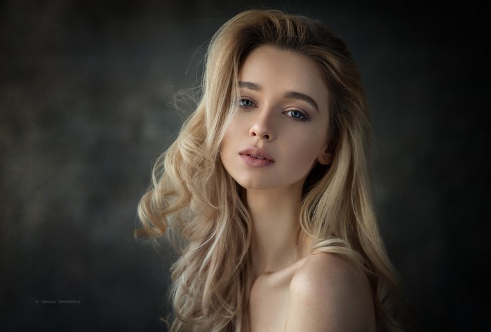 Portrait of a Blonde Woman with Blue Eyes