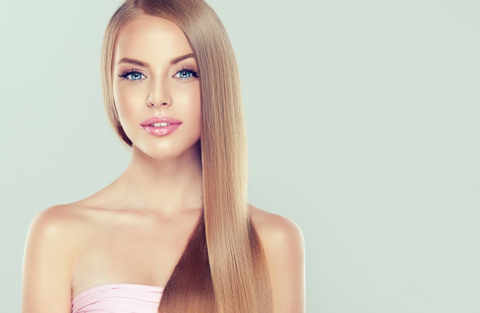 Woman with Long Blonde Hair and Blue Eyes