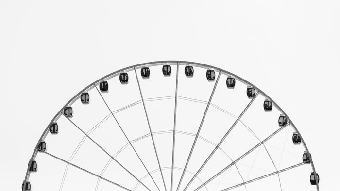 Minimalist Ferris Wheel against White Background
