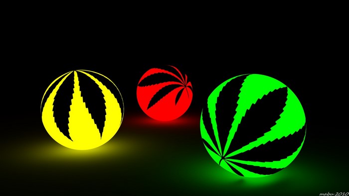 Three glowing marijuana leaf spheres on black background