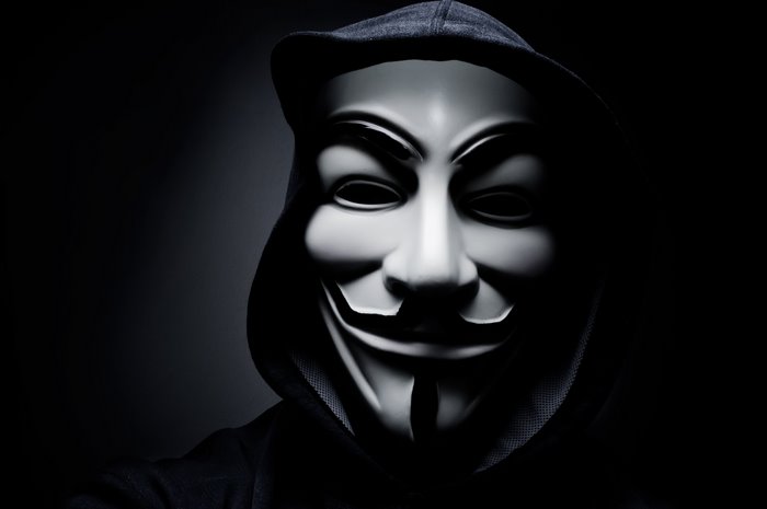 Anonymous Masked Hacker in Dark Hoodie