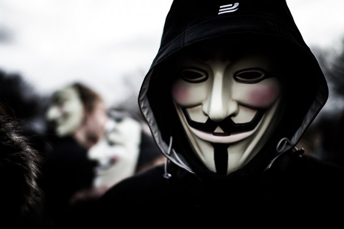 Anonymous hacker wearing a Guy Fawkes mask