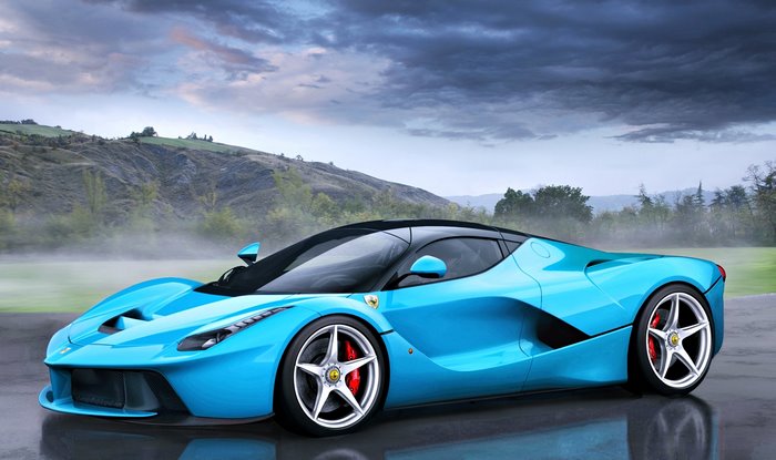 Blue Ferrari LaFerrari Supercar in Foggy Landscape