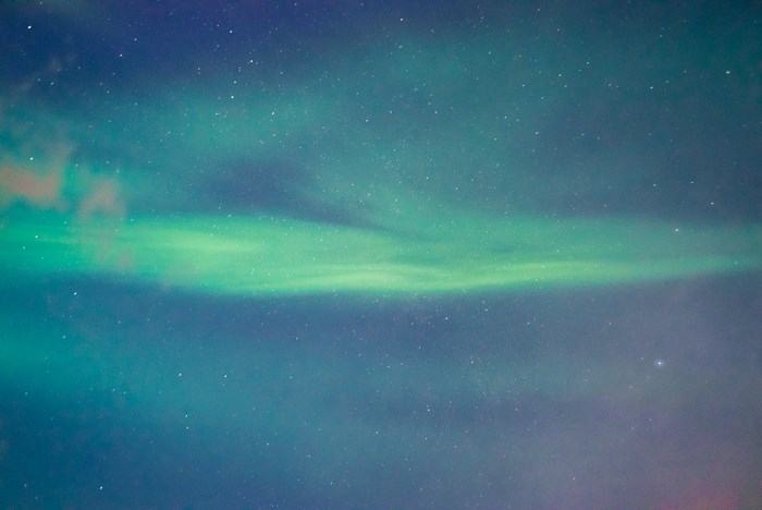 Aurora Borealis over a starry night sky