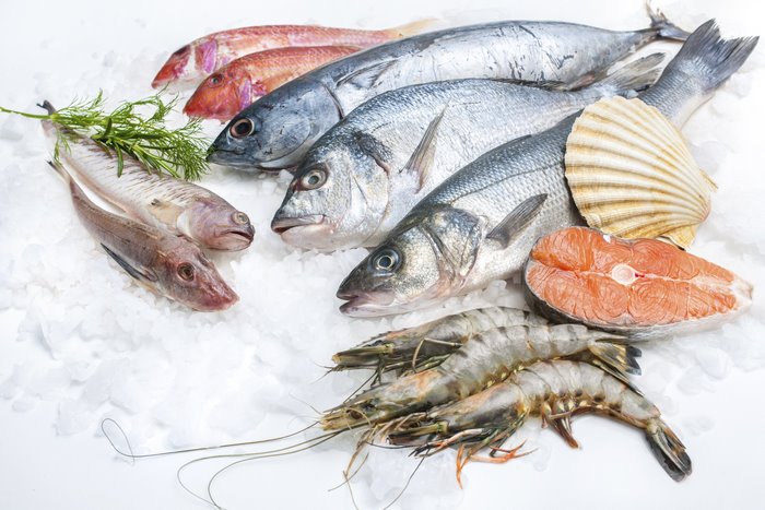 Assortment of fresh seafood on ice