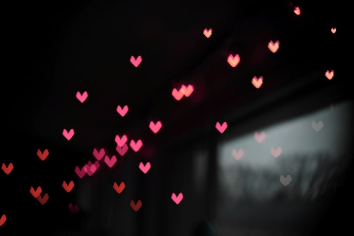 Pink and Red Heart-Shaped Bokeh Lights at Night