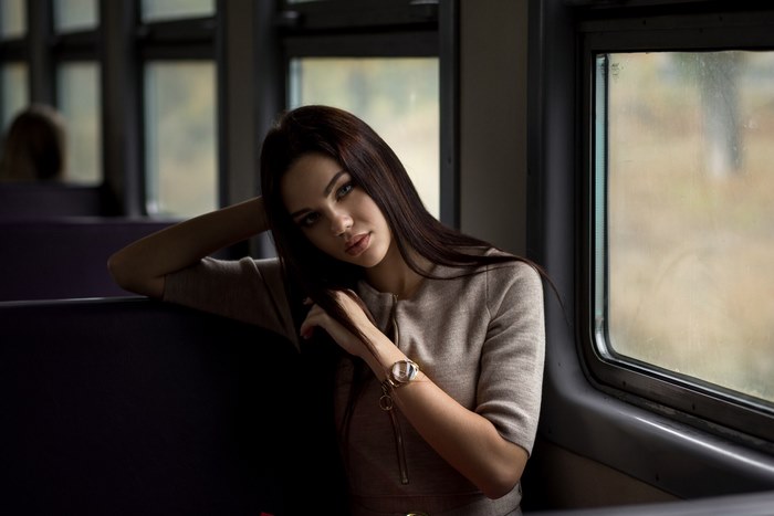 Violetta Milovanova sitting on a train