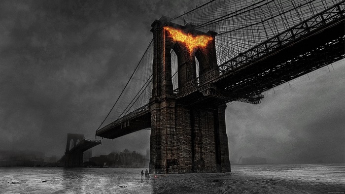 Batman from The Dark Knight Rises on a burning bridge