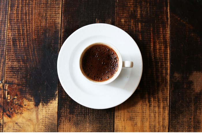 Cup of coffee on a wooden table