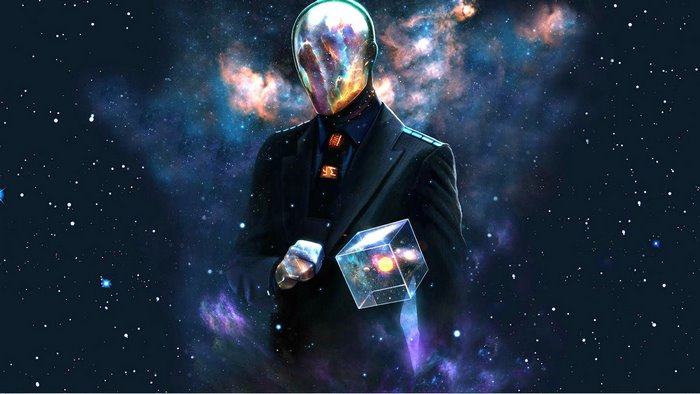 Man in suit with galaxy head holding a cube in space