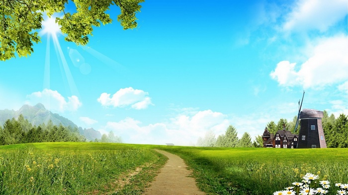 Sunny meadow with a path and windmill
