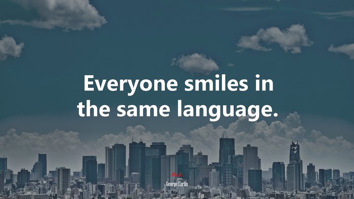 Everyone smiles in the same language. | George Carlin quote