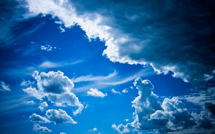 Dramatic sky with dark and white clouds