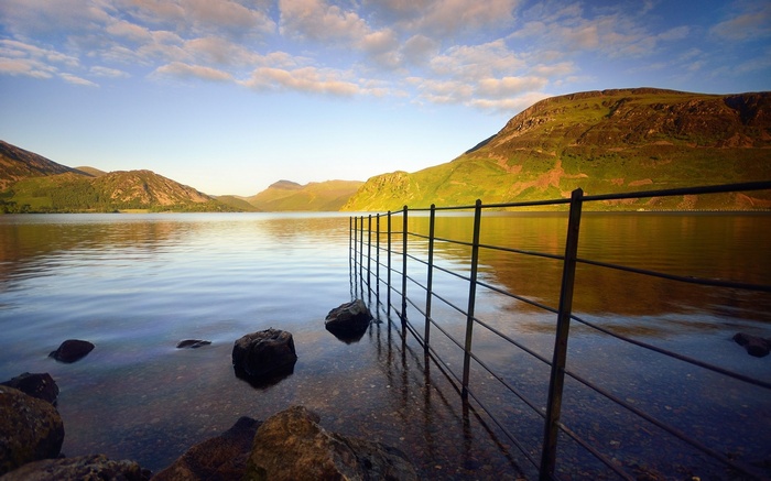 Lake and Mountains with a Fence