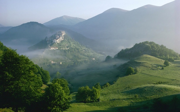 Mountain village in the fog