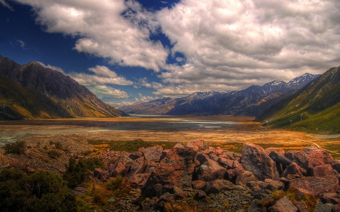 Valley with mountains and rocky foreground