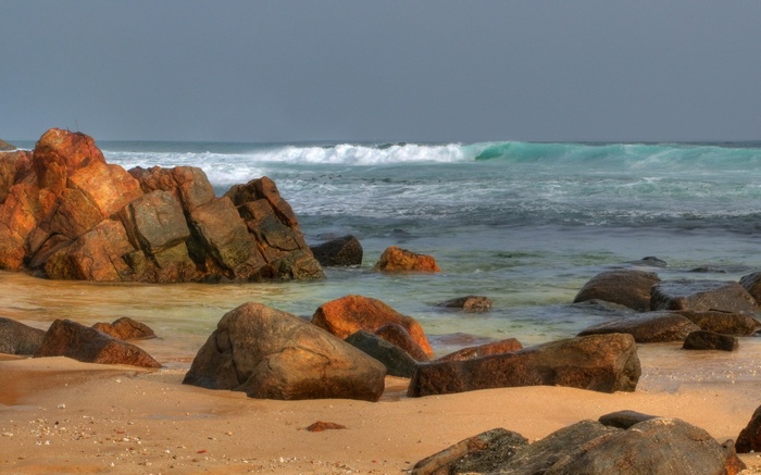 Ocean waves crashing on a rocky beach