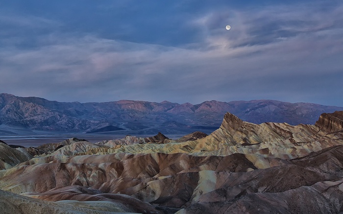 Moon over Zabriskie Point Badlands, Death Valley National Park
