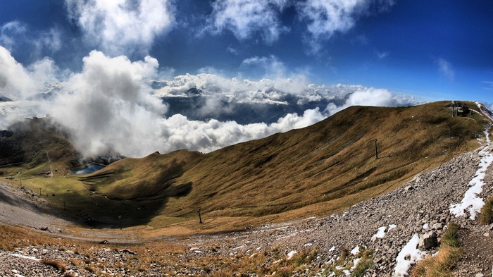 Mountain landscape with clouds and a lake