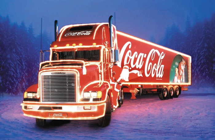 Coca-Cola Christmas Truck with Santa in Snowy Forest