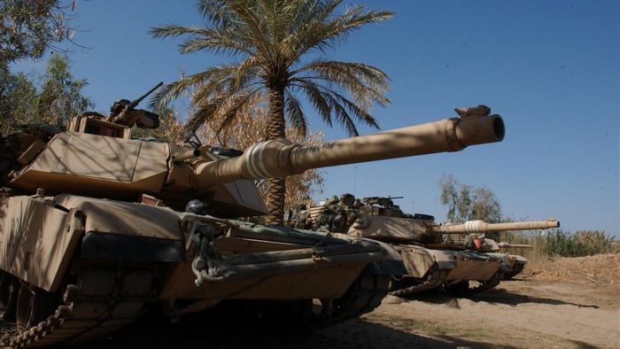 Tanks in a desert landscape