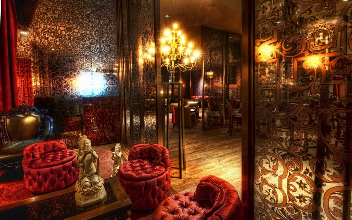 Ornate interior with red velvet seating and ornate decor