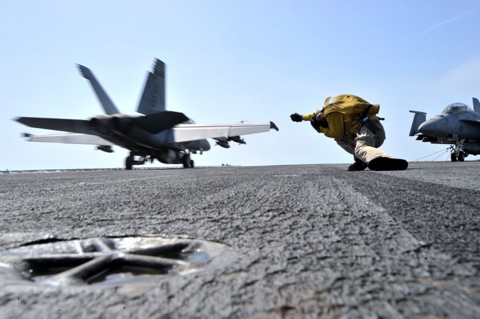 F-18 Fighter Airplane on Aircraft Carrier Deck